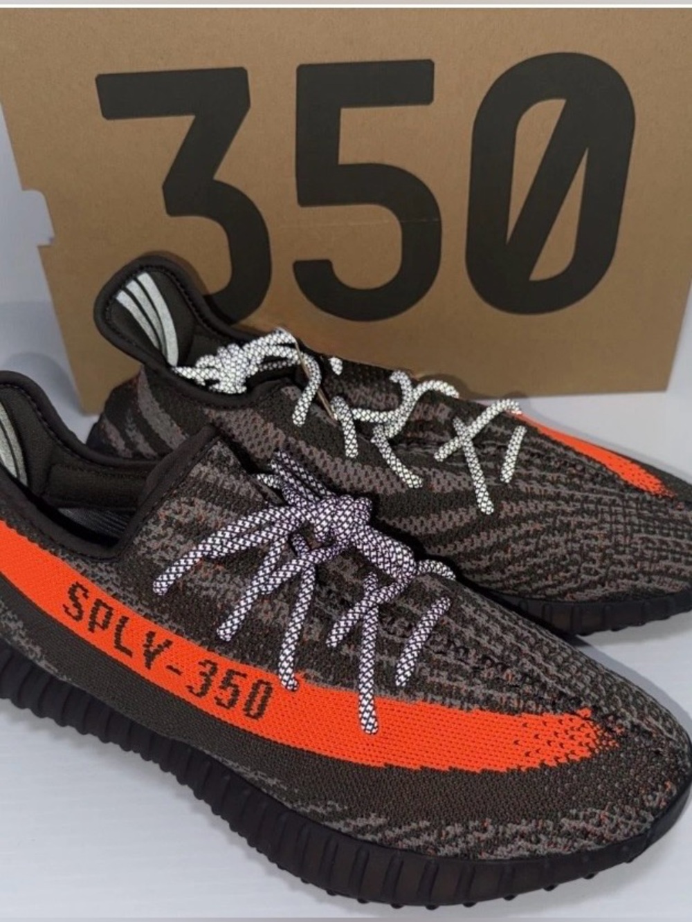 Yeezy Orange and Black Stripe Sneakers